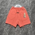 Essentials Men's Orange and Pink Shorts