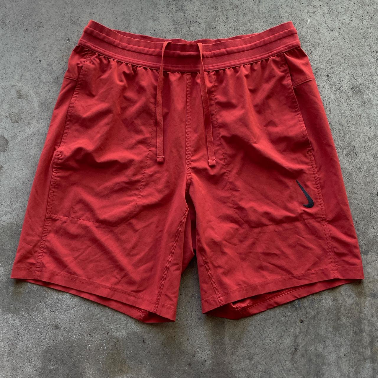 P0 Nike Men's Red and Orange Shorts - Image 1